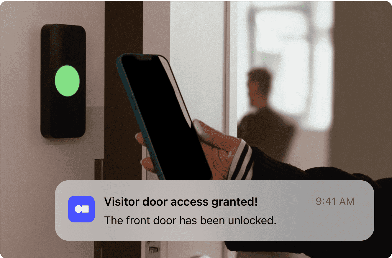 Tablet screen showing a visitor registration form with a green light indicating access granted.