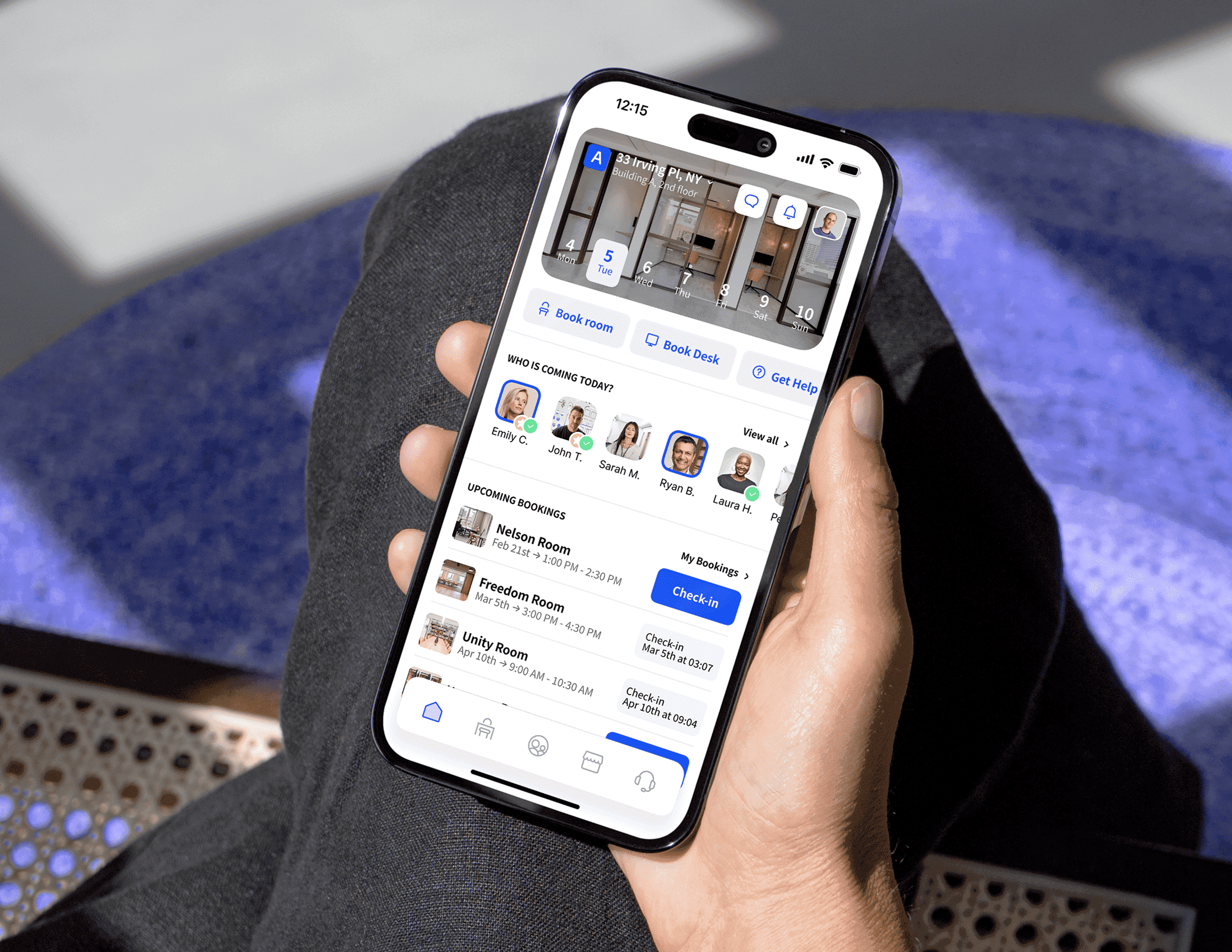 Person holding a smartphone using Archie space management app.
