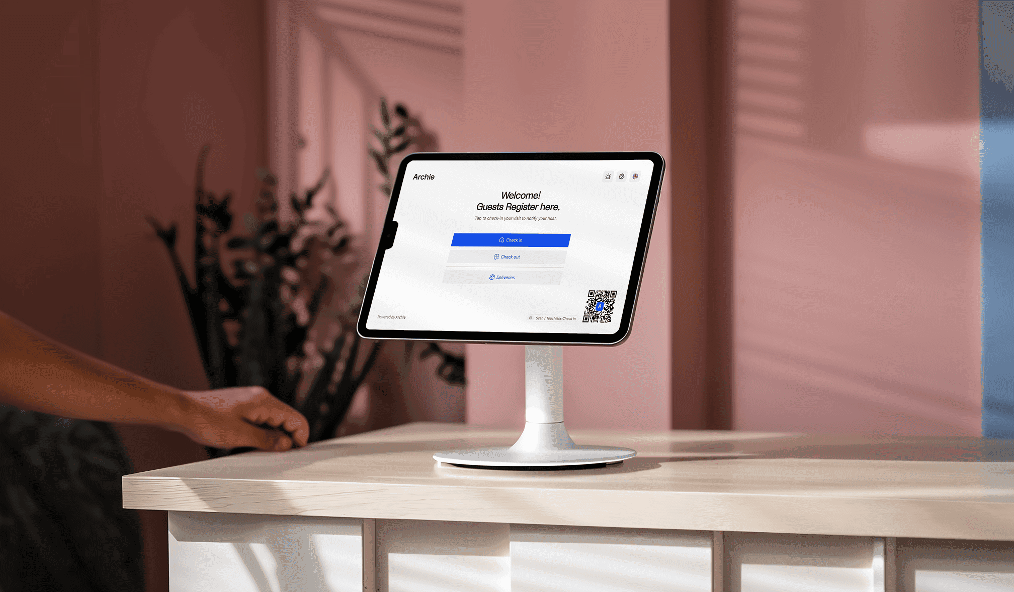 Guest check-in tablet screen with Archie Visitors app showing options to check in, check out, or mark deliveries.